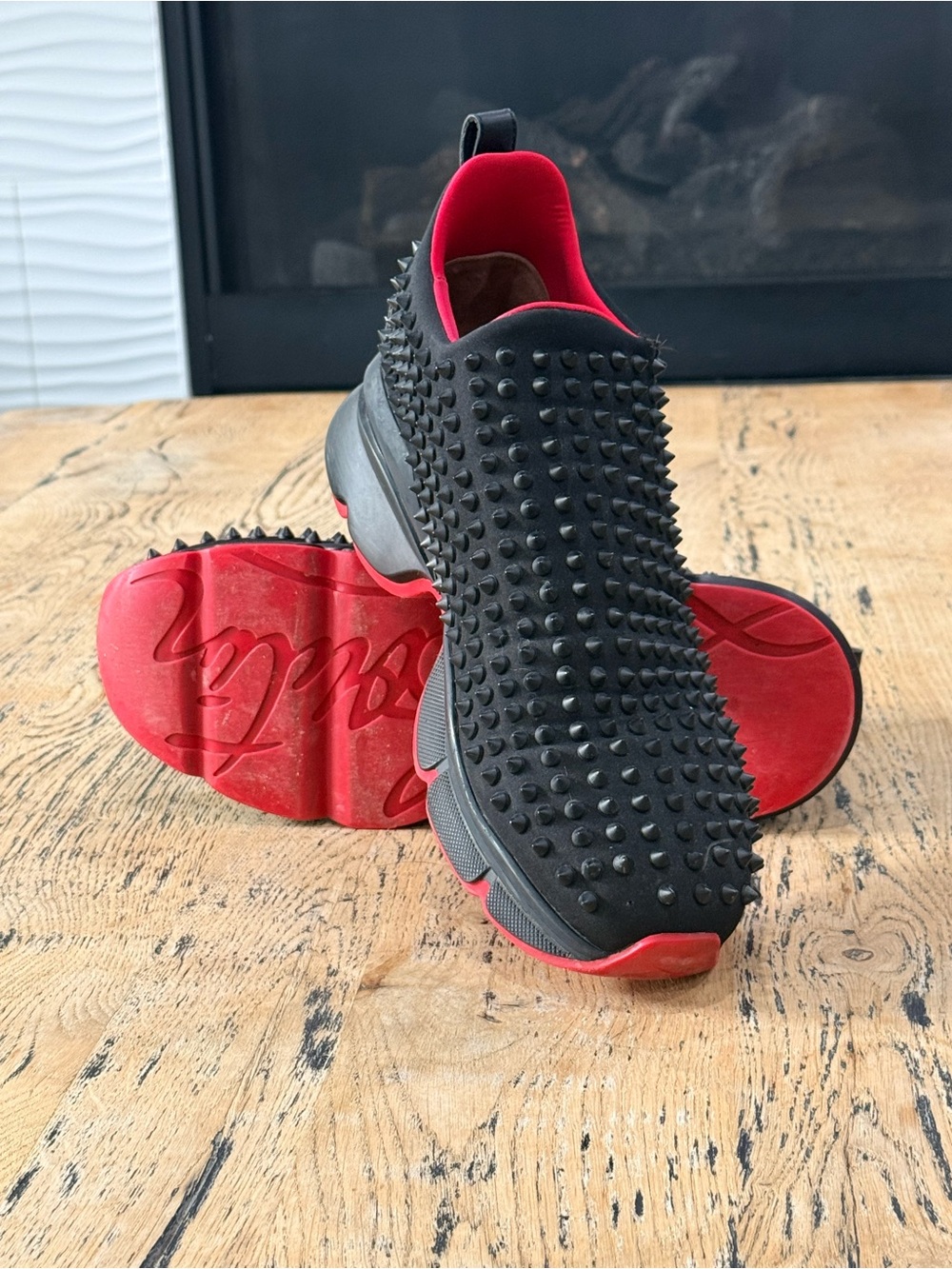 Christian Louboutin Black Slip-On Spiked Sneakers with Red Sole